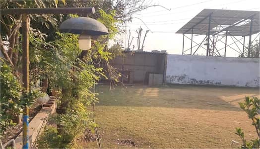 4 kanal Plot with Building on Main Express Way Interchange Big Front On Rent