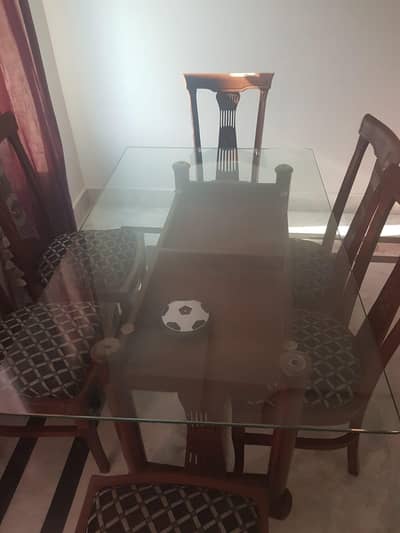 Dinning Table Glass Top with 6 wooden vision chairs