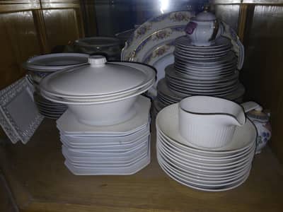 moving sale various dinner sets.