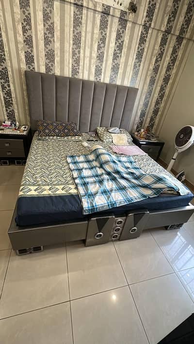 king size Grey and Black bed.