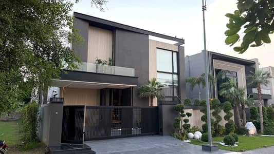 One Kanal Brand New Luxury Ultra-Modern Design Most Beautiful Fully Furnished Bungalow 2 Servant Quarter In Basement For Sale At Prime Location Of DHA Lahore Near To Park Masjid & Commercial Market.