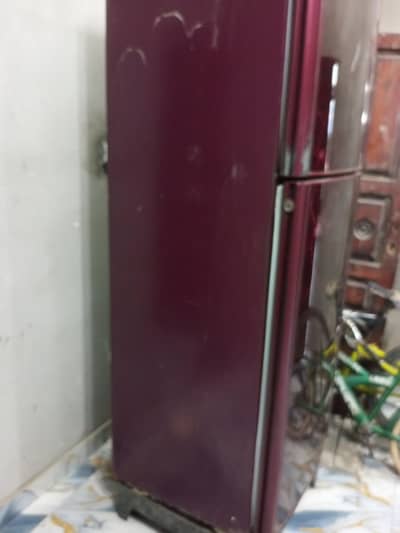 full size refrigerator with miner damage