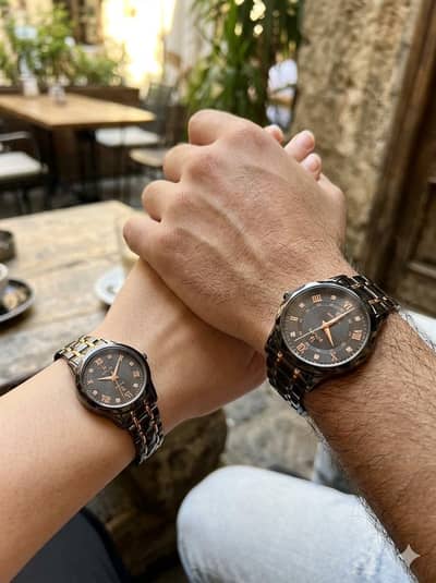 Beautiful elegant couple watches