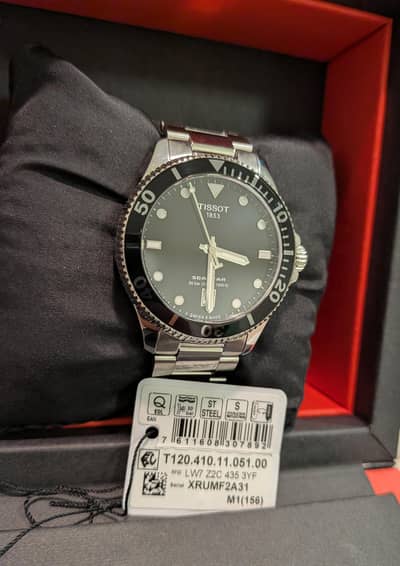 Tissot Sea Star 36mm Quartz, Black color with box and warranty card