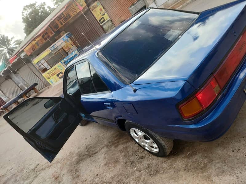 Mazda 323 1990 model 3