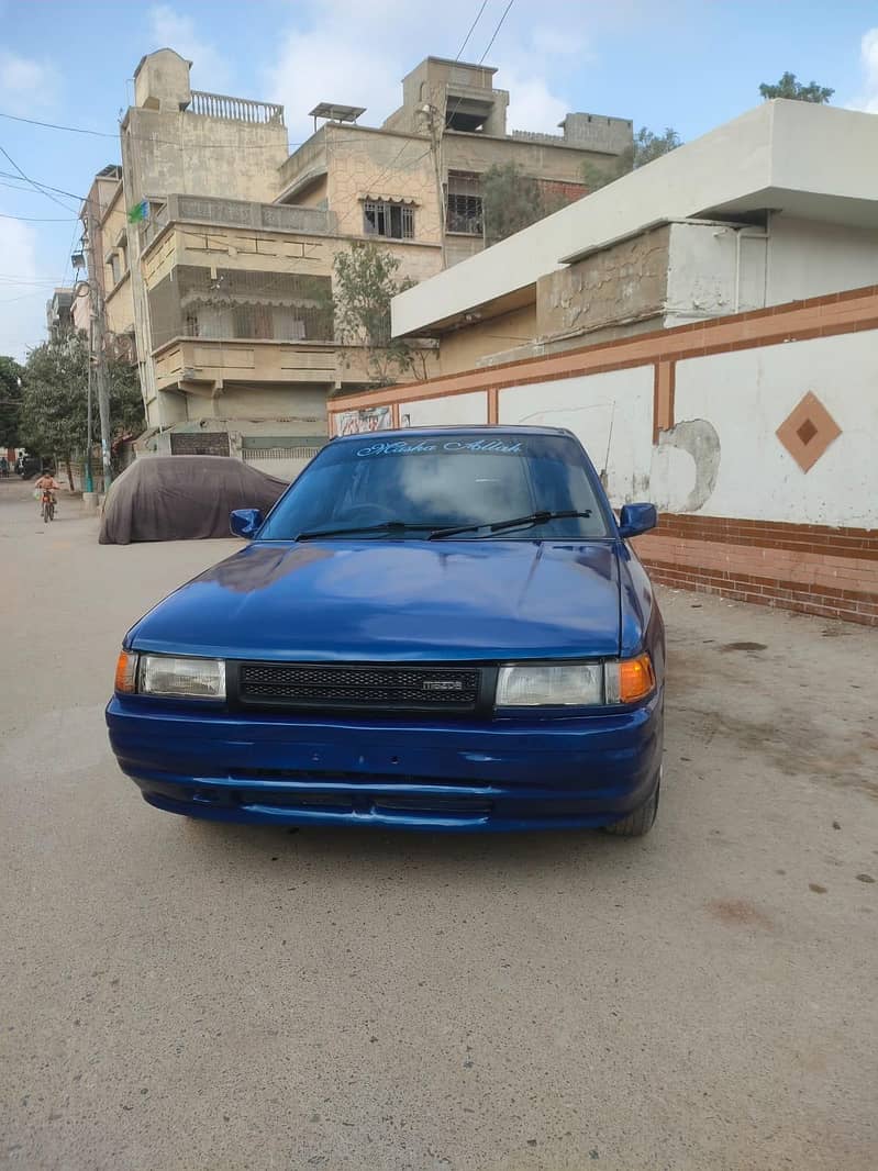 Mazda 323 1990 model 4
