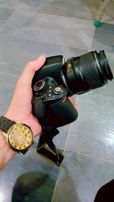 nikon d3100 with nikon 18-55mm lense f3.5-5.6G A one condition