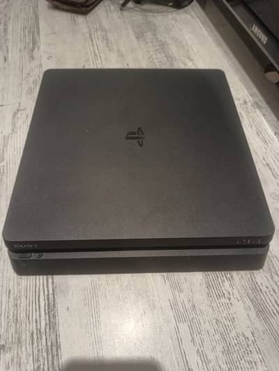 Ps4 slim 1 TB with accessories UAE bought