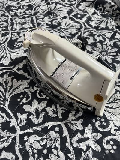 NATIONAL DRY IRON UNUSED