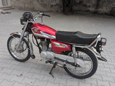 CG Honda 125 total genuine original silencer available