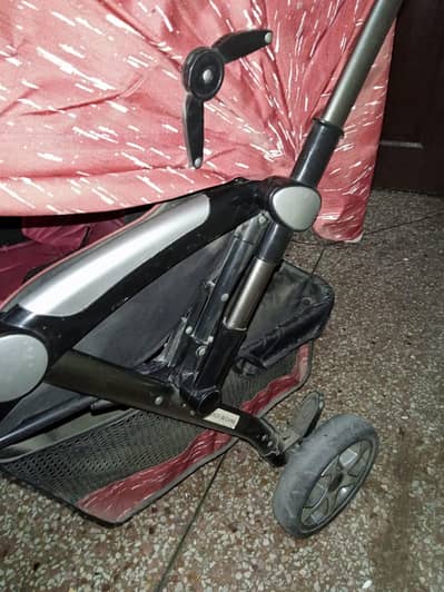 baby pram in red color