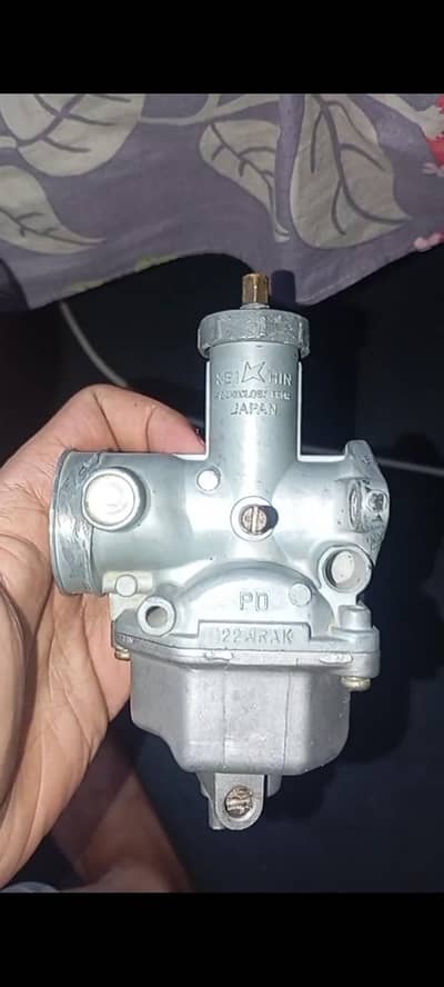 125 old model geniun carburetor