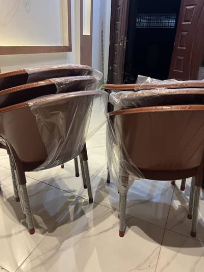 6 New plastic chairs. 03480230104