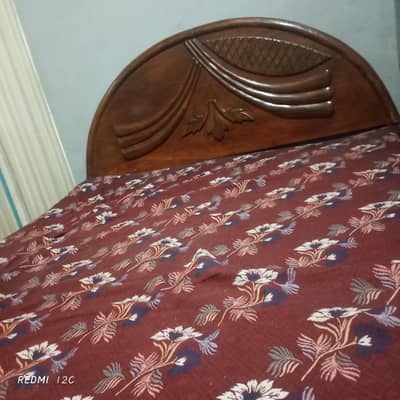 Queen size bed with mattress in good condition