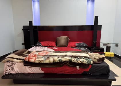 Black Stylish modern bed with joined side table drawers and mattress