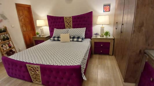 Bed with side tables available in brand new condition.