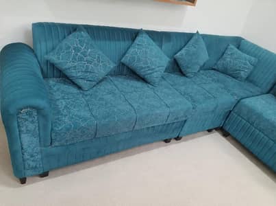 L shaped sofa with cushions