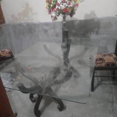 Dinning table with 6 chairs and 1 flower piece