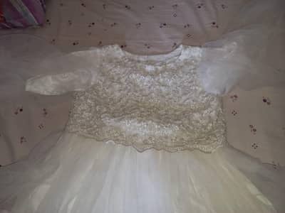 Elegant white net maxi for for  with beautiful embroidery and net wort