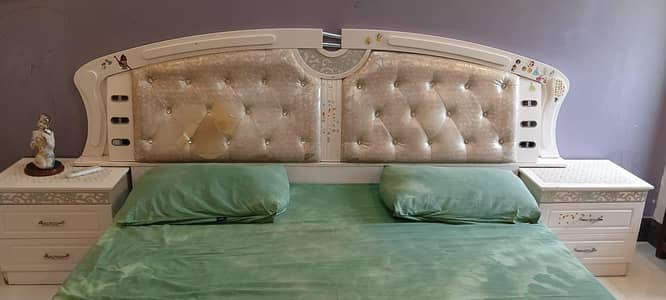 bed with side tables