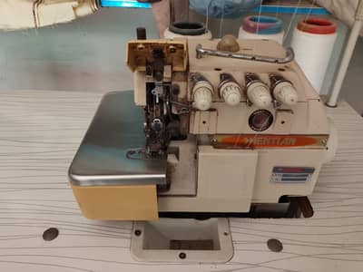 over lock machine urgent sale