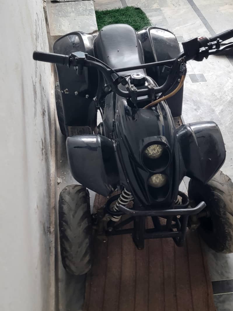 4 Tyre Scooter Self start 1
