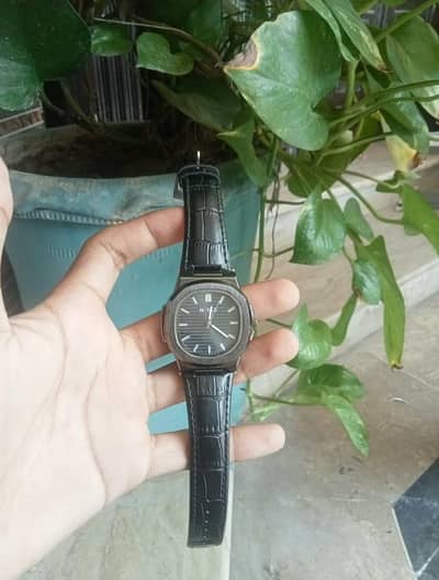 Tissot and patek watch