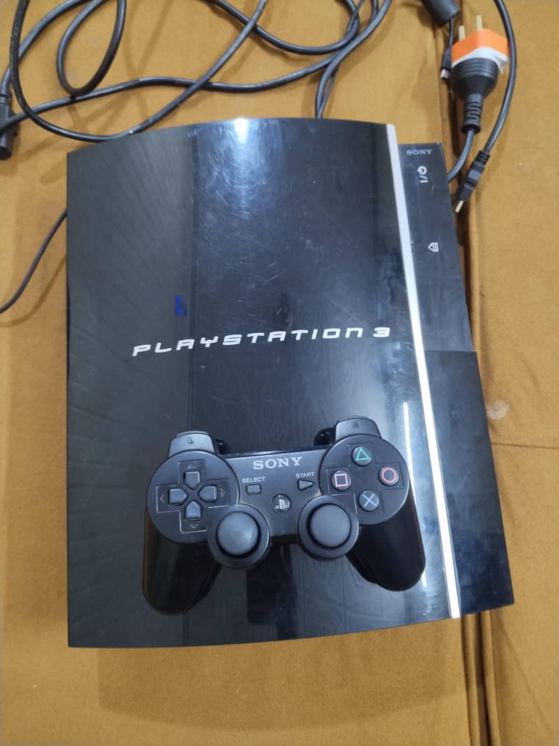 PS3 with controller 1