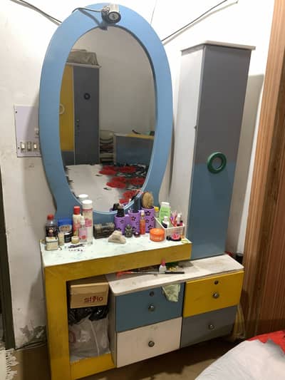 Bed with dressing table
