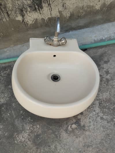 Basin and toilet tank