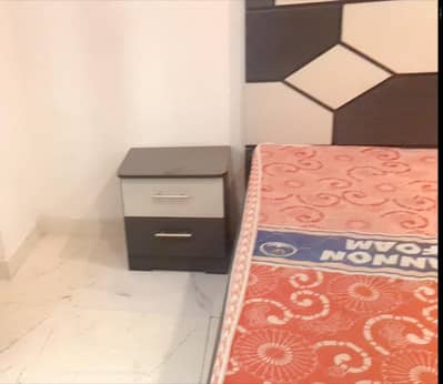 Almost new Bed for sale with Mattress and side table