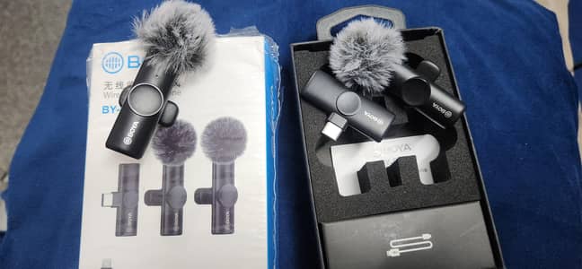 Wireless mic 2 transmitter 1 reciever New conditionBoya