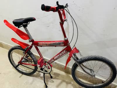 red colour bicycle new all okay