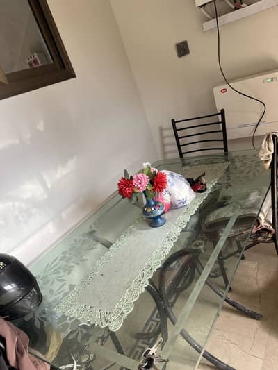 Table and 6 chair, yeah the local brand