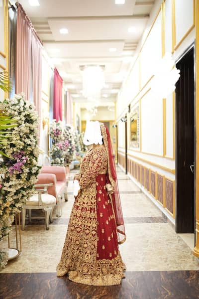 Bridal Maroon & Gold Heavy Embroidered Lehenga – Used Once (4 hours)