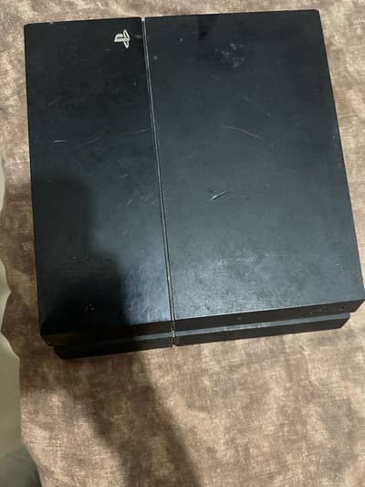 PS4 Console with 2 Original Controllers & Games – Excellent Condition