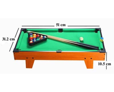 This is a small Pool Table Which has one ball missing