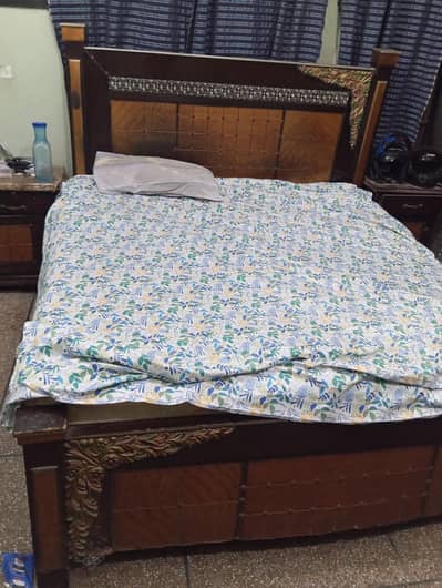 king size bed with side table and dressing