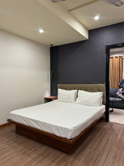Daily weekly basis 2 bedrooms apartment fully luxury furnished available for rent location E-11 2 markaz