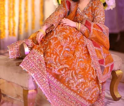 Kanwal malik   Orange bridal collection angrakha style