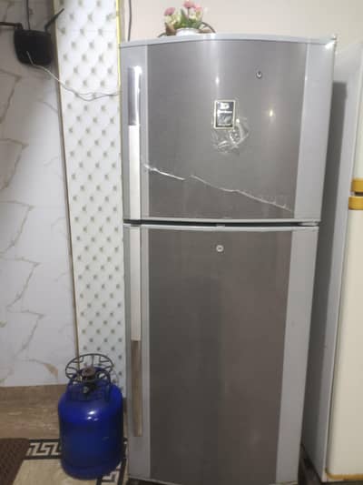 two medium sized refrigerators