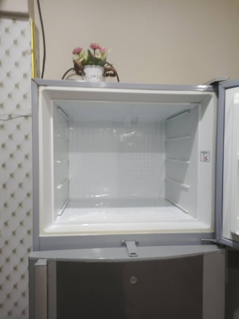 two medium sized refrigerators 2