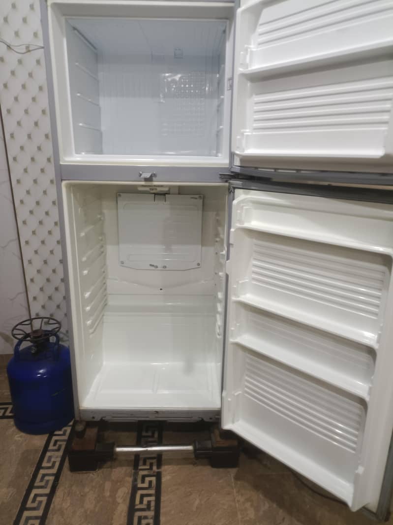 two medium sized refrigerators 6