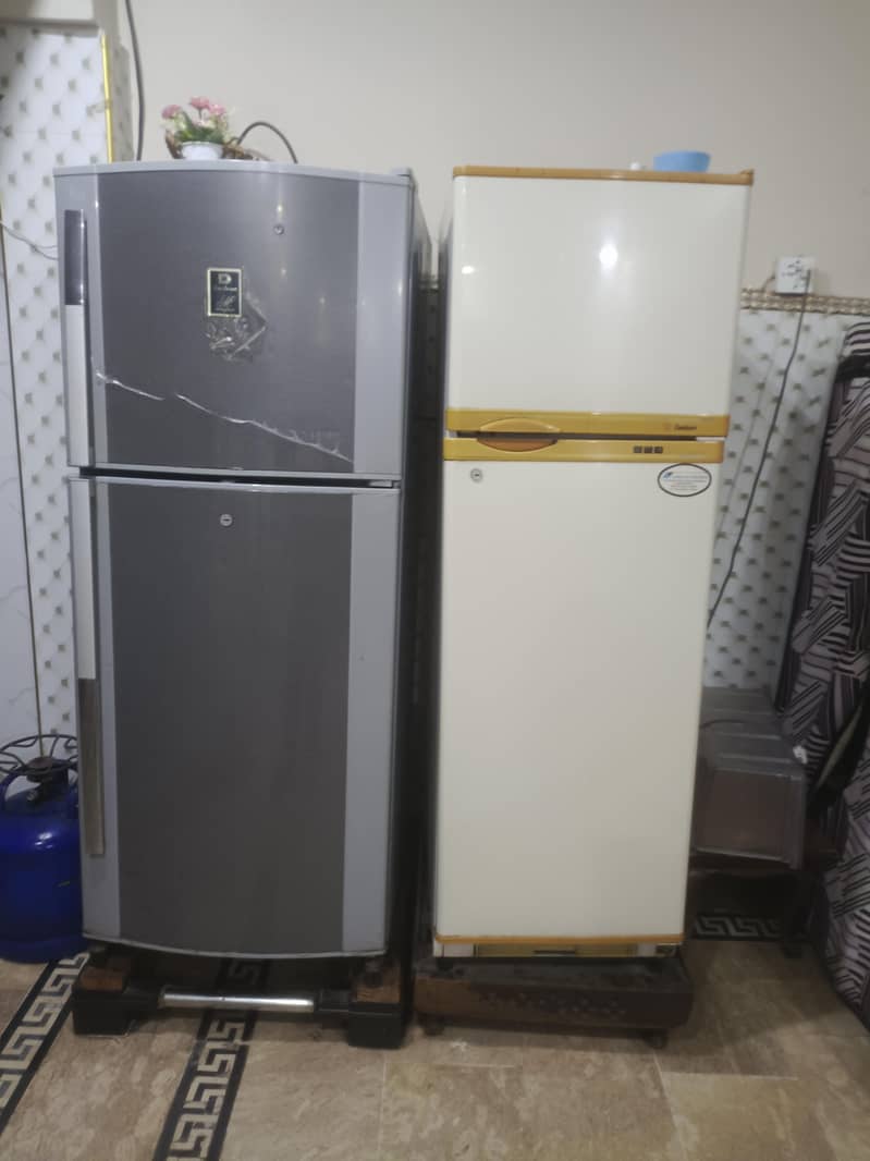 two medium sized refrigerators 7