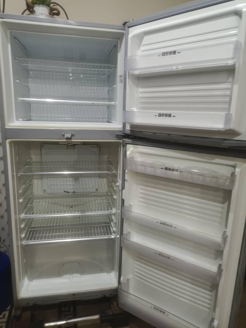 two medium sized refrigerators 10