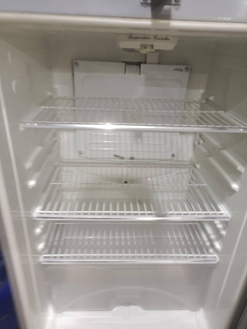 two medium sized refrigerators 13