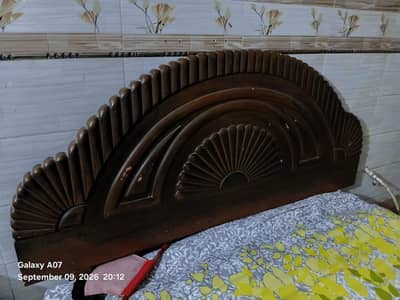 wooden king size bed and dressing table