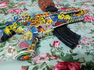 it is gel blaster gun used with box and battery charger suppressor