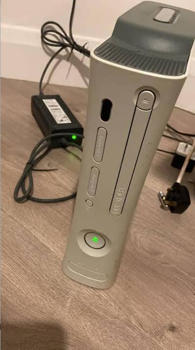 Xbox 360 with 2 wire controller and 50 plus games