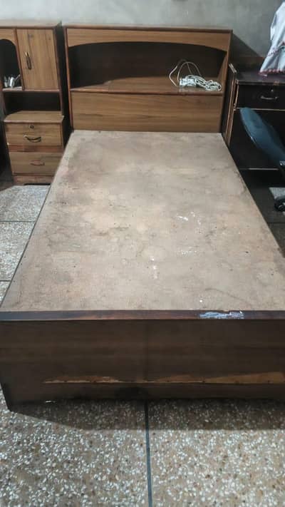 1 single bed 1 side table 1 computer table